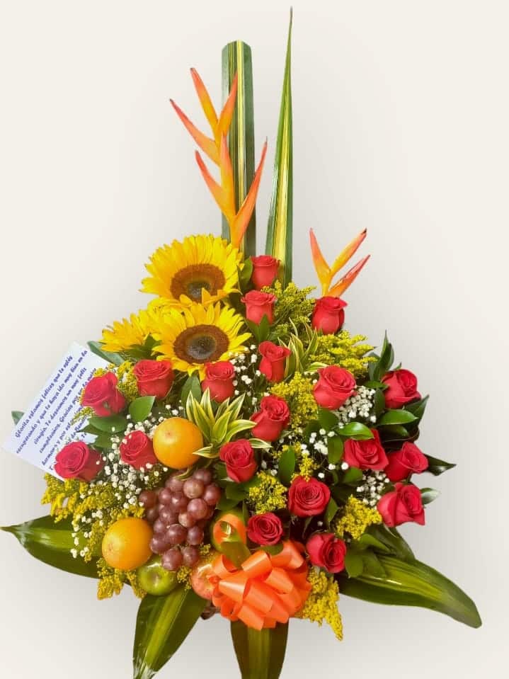 Arreglo Floral Con Frutas Tr Pico Girasoles Heliconia Follajes Verdes