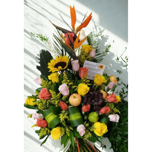 Floral Arrangement with Tropical Fruits