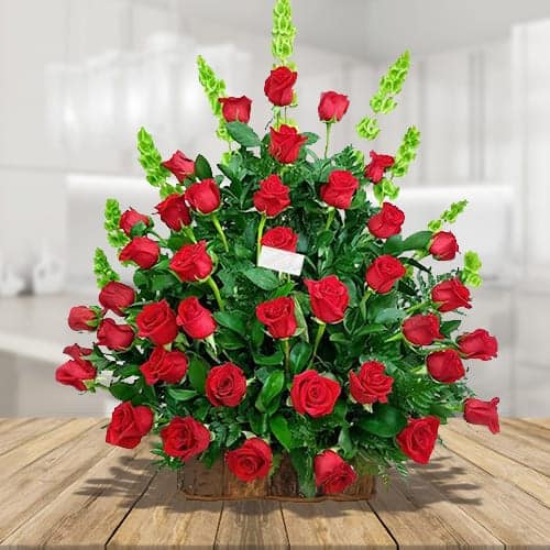 Cupid Floral Arrangement with Roses